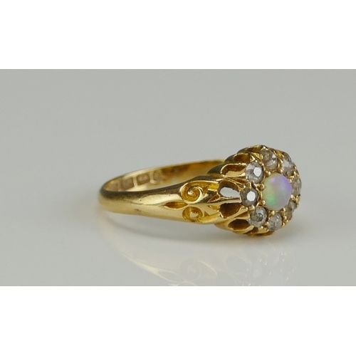 191 - An Antique 18ct Gold, Opal and Old Cut Diamond Ring, c. 8.8mm head, size K, Birmingham 1904, 3g