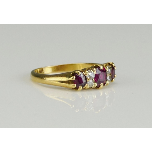 194 - A Victorian 18ct Gold, Ruby and Old Cut Diamond Seven Stone Ring, c. c. 4.9c4.5mm principal stone, s... 