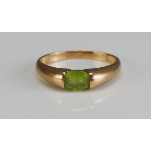 20 - A 14K Gold and Green Gem Set Ring, size O.25, stamped continental marks, 3g