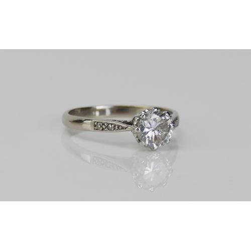 214 - An 18ct White Gold and Diamond Platinum Set Solitaire Ring, c. 6.7mm brilliant round cut stone, size... 