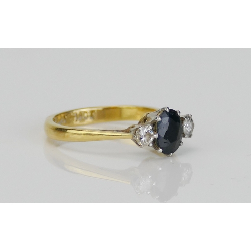 267 - An 18ct Gold, Sapphire and Diamond Platinum Set Three Stone Ring, c. 6x5.1mm principal stone, 3mm br... 