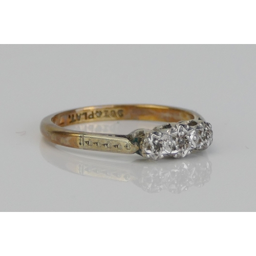 270 - A 9ct Gold and Diamond Three Stone Platinum Illusion Set Ring, size J, stamped 9CT&PLAT, 1.69g