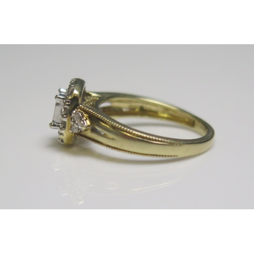 300 - A 9ct gold diamond square cluster ring, 2.8gms, size J.5