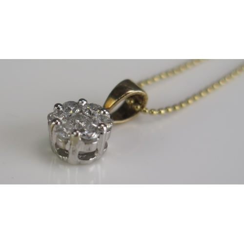 307 - An 18ct gold diamond cluster pendant, on 18ct gold chain, length of chain 222mm.