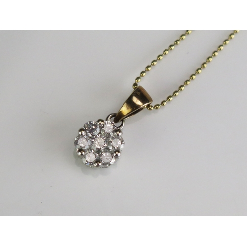 307 - An 18ct gold diamond cluster pendant, on 18ct gold chain, length of chain 222mm.