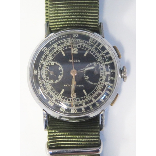 309 - A Military style stainless steel chronograph, the 30mm dial signed Rolex, with subsidiary second and... 