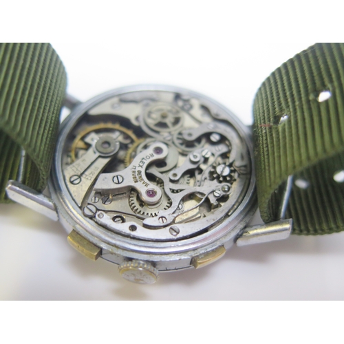 309 - A Military style stainless steel chronograph, the 30mm dial signed Rolex, with subsidiary second and... 