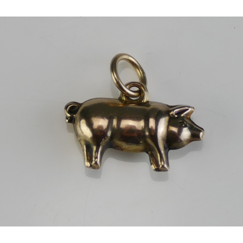 39 - A 9ct Gold Pig Charm, .8g