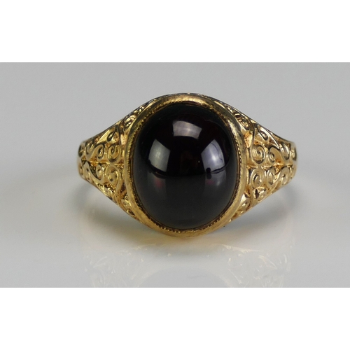 4 - A 9ct Gold and Cabochon Garnet Dress Ring, 11.9x10mm stone, size S.5, hallmarked, 5.67g