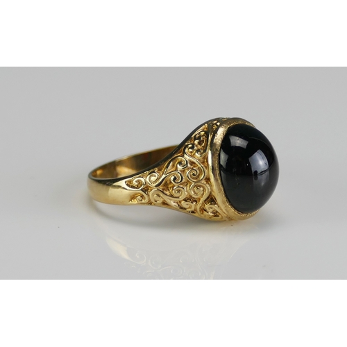 4 - A 9ct Gold and Cabochon Garnet Dress Ring, 11.9x10mm stone, size S.5, hallmarked, 5.67g