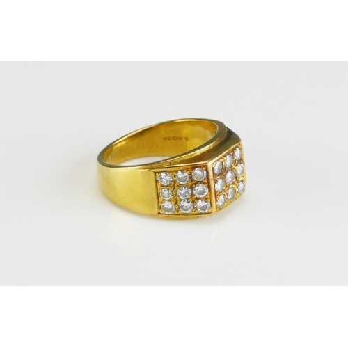 40 - An 18ct Gold and Diamond Ring, set with 2.3mm brilliant cuts arranged in three panels of nine, size ... 