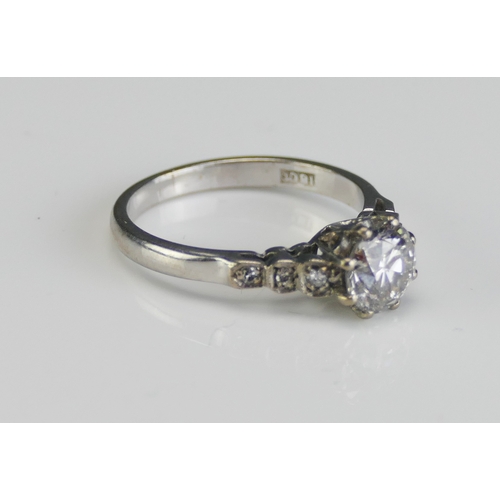 45 - An 18ct White Gold and Diamond Single Stone Ring with three millegrain set to each shoulder, 6.4mm p... 