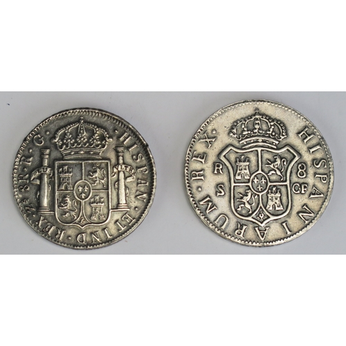 496 - A reproduction Ferdinand VII 8 Reales coin, and a Charles III 8 reales coin.