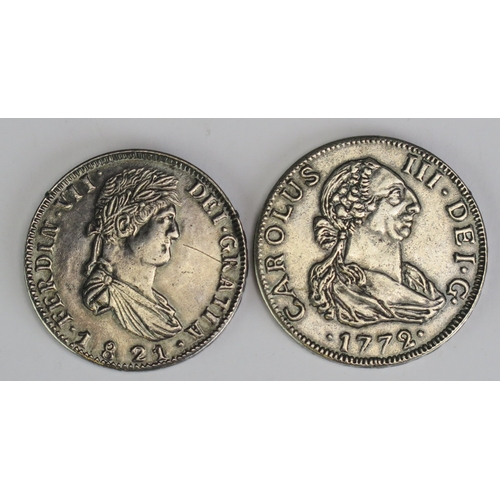 496 - A reproduction Ferdinand VII 8 Reales coin, and a Charles III 8 reales coin.