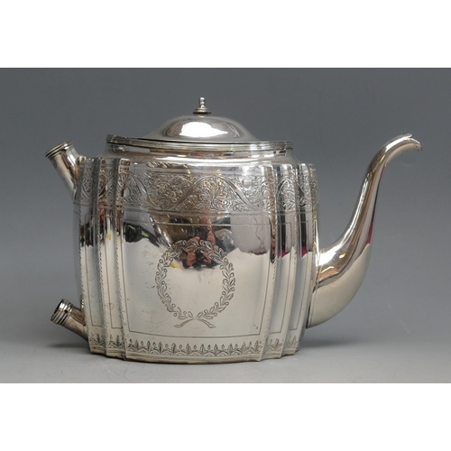 505 - A George III silver teapot, maker Samuel Godbehere & Edward Wigan, London, 1798, with oval fluted bo... 