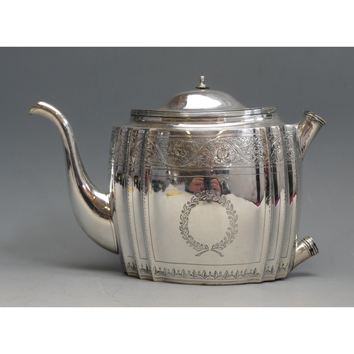 505 - A George III silver teapot, maker Samuel Godbehere & Edward Wigan, London, 1798, with oval fluted bo... 