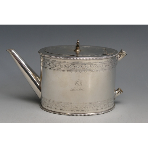 507 - A Victorian silver teapot, maker Robert Harper, London, 1868, monogrammed, of oval outline with chas... 