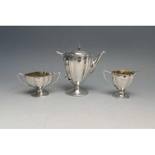 508 - An Edward VII silver three-piece bachelors coffee service, maker James Deakin & Sons, Chester, 1904,... 