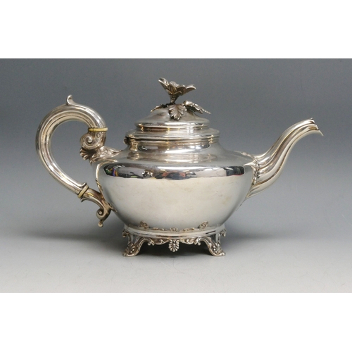 518 - A William IV silver teapot, maker's mark worn, London, 1834, of circular tapering form, with flowerh... 