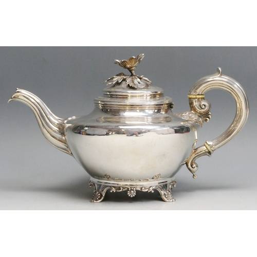 518 - A William IV silver teapot, maker's mark worn, London, 1834, of circular tapering form, with flowerh... 