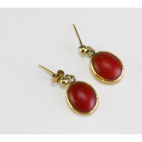 52 - A Pair of Coral Pendant Earrings in a precious yellow metal setting, KEE tests as 9ct, 3.19g. UNLESS... 