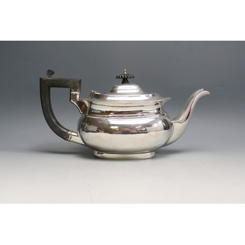 525 - A George V silver teapot, maker Deakin & Francis, Birmingham, 1928, inscribed to the base, of barge-... 