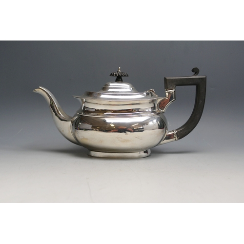 525 - A George V silver teapot, maker Deakin & Francis, Birmingham, 1928, inscribed to the base, of barge-... 