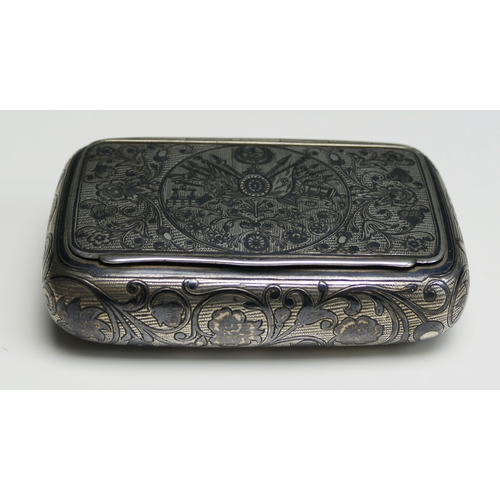 532 - An Imperial Russian silver and niello snuff box of rectangular outline, unmarked but dated 1897, the... 