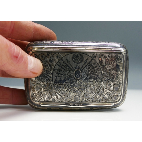 532 - An Imperial Russian silver and niello snuff box of rectangular outline, unmarked but dated 1897, the... 