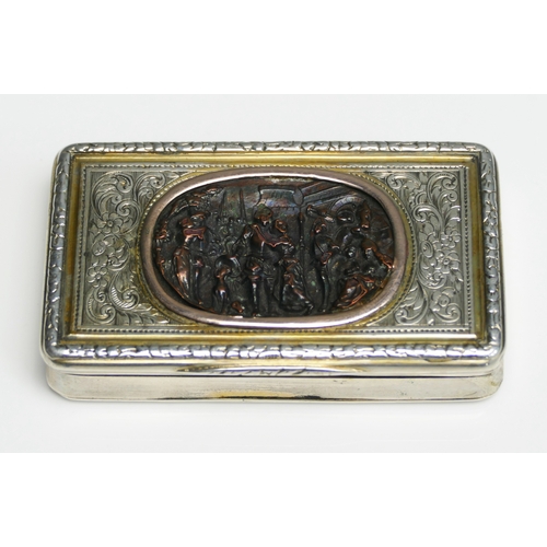 537 - An early 19th century French parcel gilt and silver  snuff box, stamped marks, of rectangular form, ... 