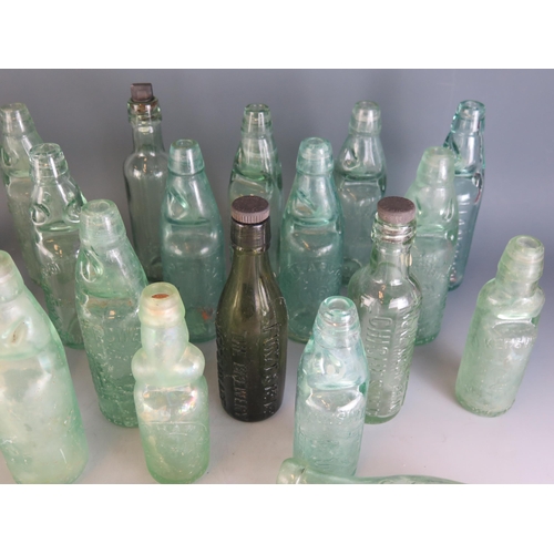 1732 - A collection of glass lemonade and other bottles, various shapes and designs.