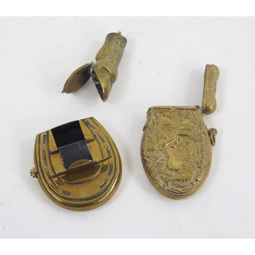 1746 - Three reproduction brass vesta cases, one in the form of a horseshoe. (3).