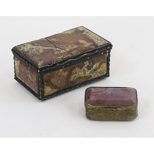 1772 - A polished hardstone and gilt metal trinket box of rectangular outline, 7cm long, a/f and a similar ... 