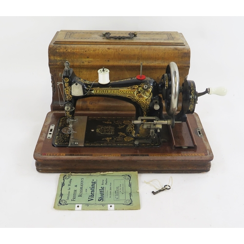 1776 - A Frister & Rossmann sewing machine, with gilt transfer print decoration, together with instruction ... 