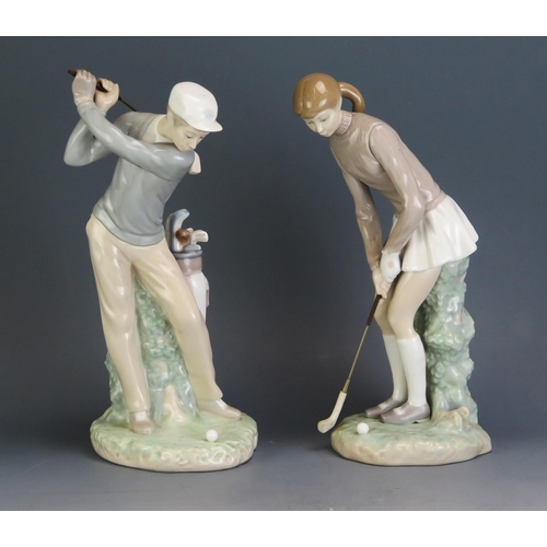 1794 - A pair of Lladro porcelain figures of boy and girl golfers on naturalistic bases, 28cm. high.