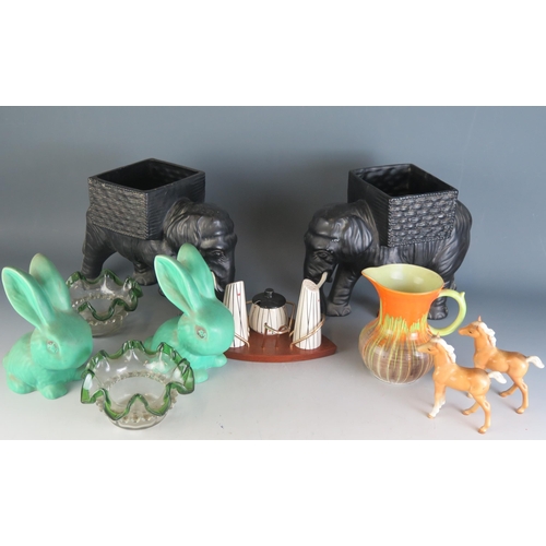 1797 - A 1960's condiment stand with pottery condiments, two Sylvac style bunnies, two Beswick ponies, a pa... 