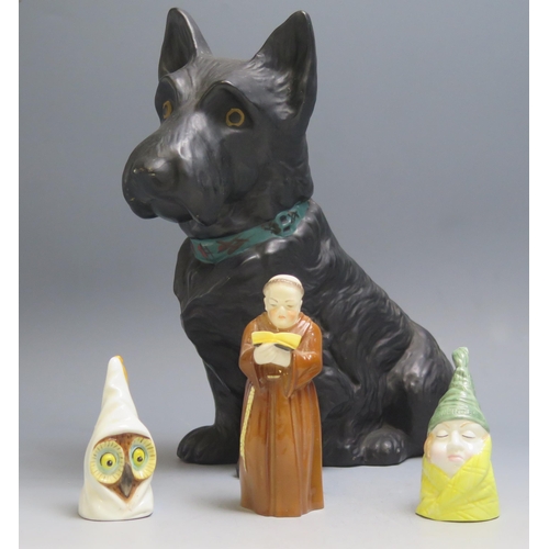 1798 - Three Royal Worcester porcelain candle snuffers, 'Mr Caudle'. 'hooded Owl', and 'Monk'. and a potter... 