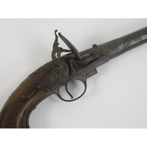 1827 - An 18th century flintlock pistol with 17cm barrel, silver mounted grip, lacks ramrod, overall length... 