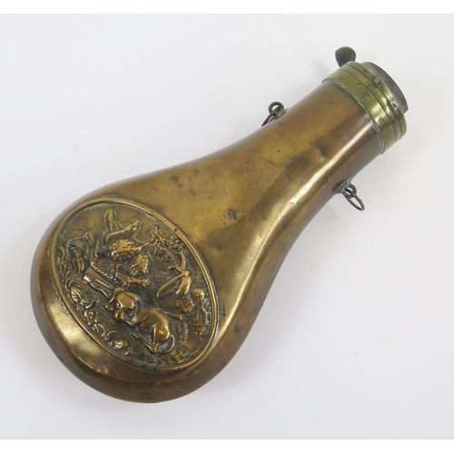 1832 - A copper shot flask with oval panel depicting dog with dead game, lacks spout.