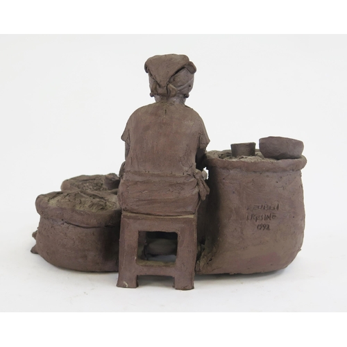 1837 - Reuben Ugbine, (Nigerian 1956- 2021), a pottery study of a seated  female street seller surrounded w... 