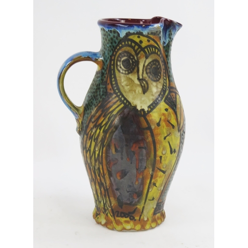 1840 - Alexandra Copeland for Dartington Pottery, owl decorated jug, with polychrome decoration, signed A. ... 