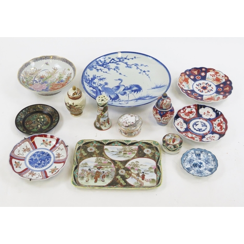 1844 - A large Arita blue and white charger decorated with cranes below a tree, 40cm diameter, Imari porcel... 