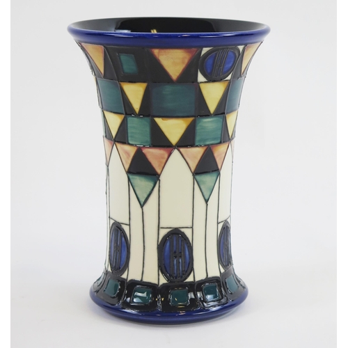 1864 - A Moorcroft pottery tribute Mackintosh vase, signed to the base E Bosson, 21cm high. Boxed.