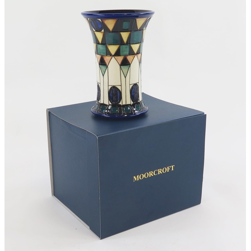 1864 - A Moorcroft pottery tribute Mackintosh vase, signed to the base E Bosson, 21cm high. Boxed.