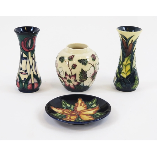 1870 - Two small Moorcroft pottery vase, of waisted form 13cm high, an ovoid  vase9.5cm high, and a small d... 