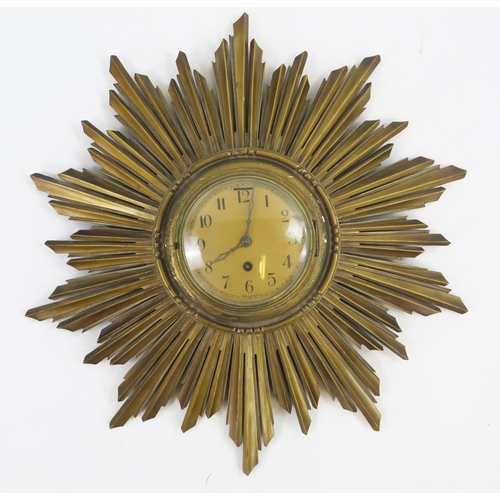 1891B - A gilt wood 'sunburst' wall timepiece with 11cm gilt Arabic dial, 48cm diameter.