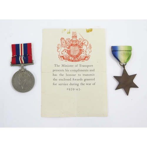 1895 - A World war II War Medal and Atlantic Star, with issue paper.