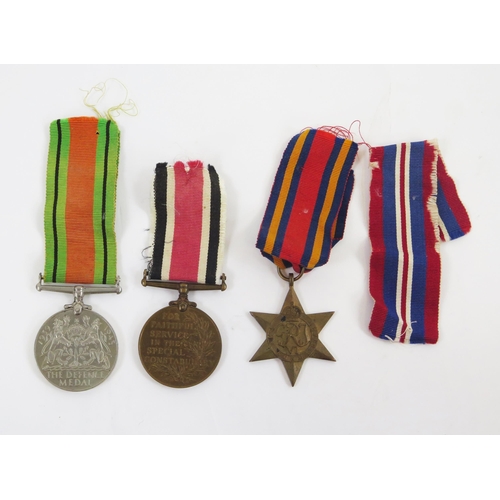 1897 - A group of three World War II medals including Defence Medal, Burma Star, and Special Constabulary M... 