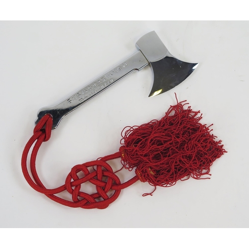 1901 - A Japanese polished steel ceremonial axe, for use on launching ships,  with red knotted cord. 22cm l... 