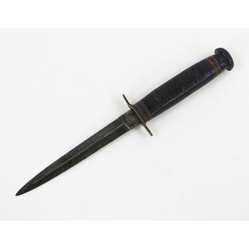 1903 - A  World War II period British fighting knife by William Rodgers, with 14cn double edged blade, and ... 